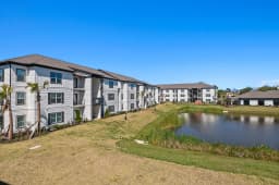 Building exterior at a Pointe Grand community