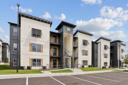 Building exterior at a Pointe Grand community