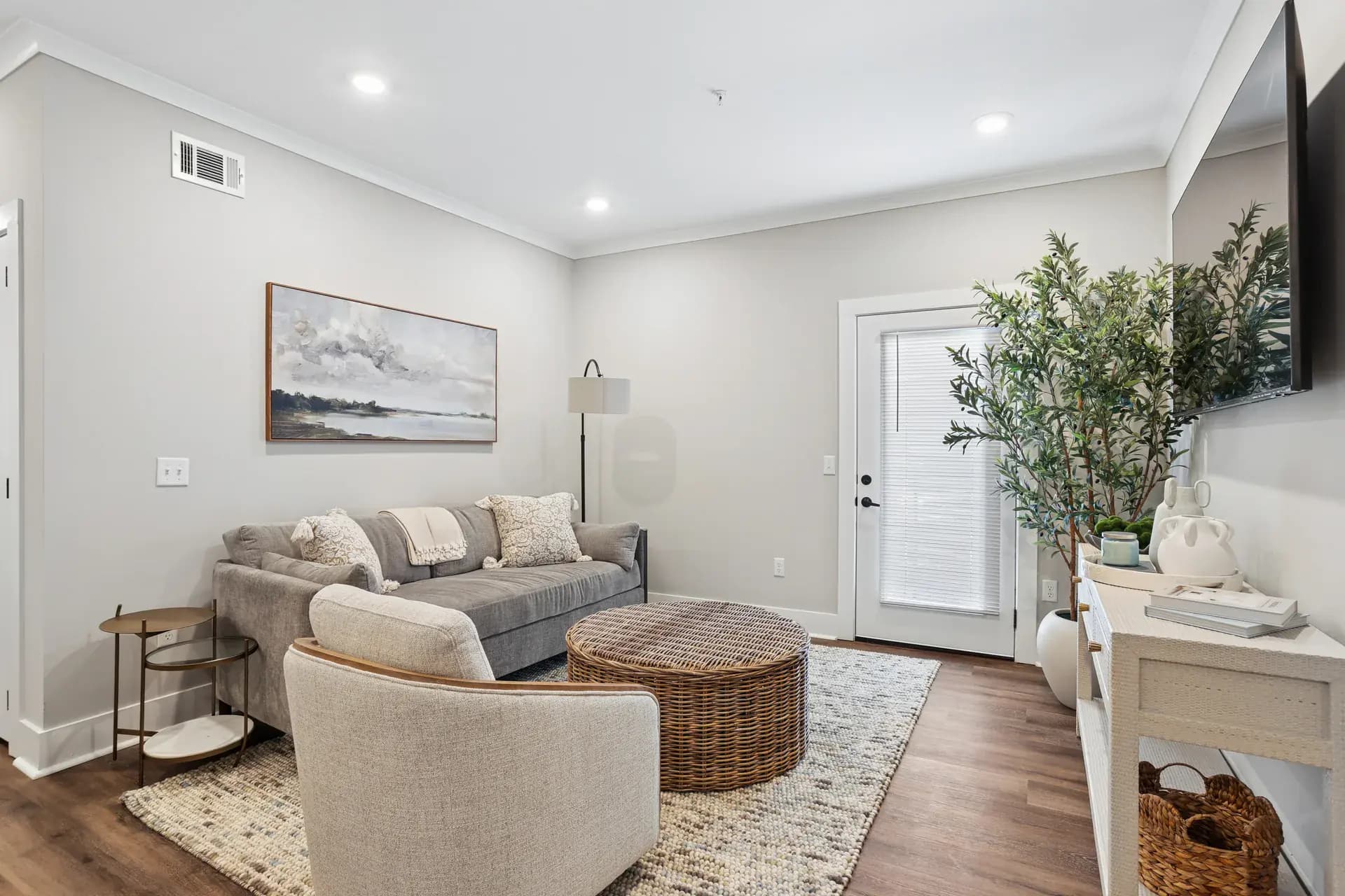 Living room in a Pointe Grand Willowbrook at Winder apartment home