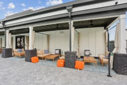 Poolside cabanas at a Pointe Grand community