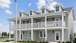 Two-story townhome building at a Pointe Grand community