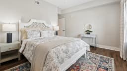 Bedroom in a Pointe Grand apartment home