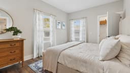 Bedroom in a Pointe Grand apartment home