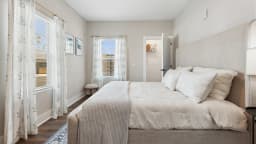 Bedroom in a Pointe Grand apartment home