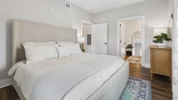 Bedroom in a Pointe Grand apartment home